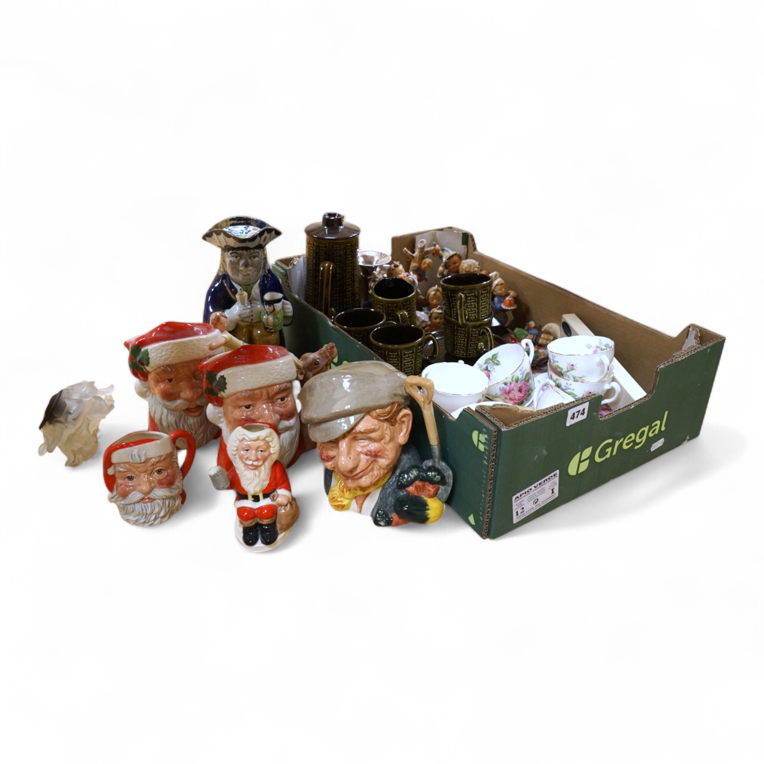A collection of ceramics to include Doulton Toby jugs, Goebel figurines and Adderley part tea set